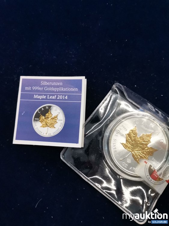 Artikel Nr. 779226: Maple Leaf 2014 Silbermünzen mit  999 er Goldapplikationen