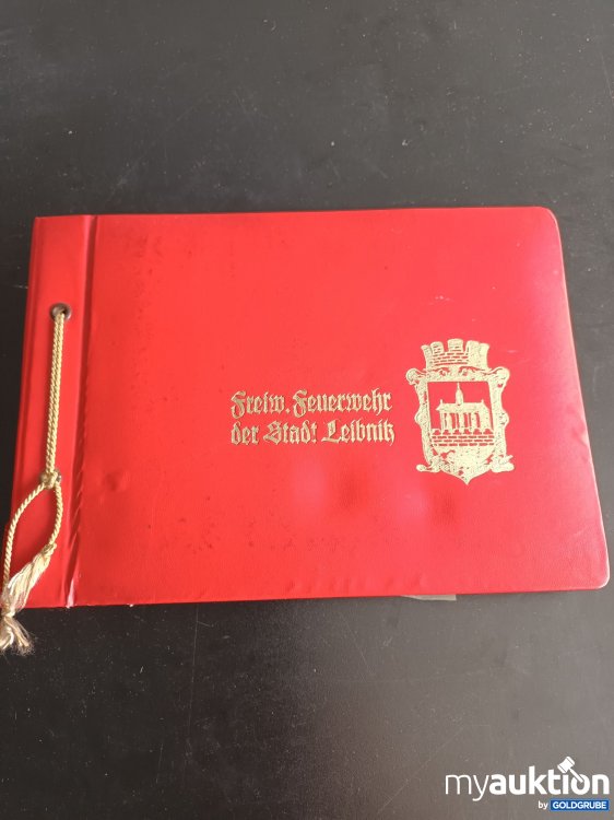 Artikel Nr. 398490 Artikel Nr. 398490: Teilbestücktes Fotoalbum der Freiwilligen Feuerwehr der Stadt Leibnitz 1956