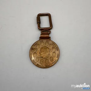 Auktion Medaille, laut Foto